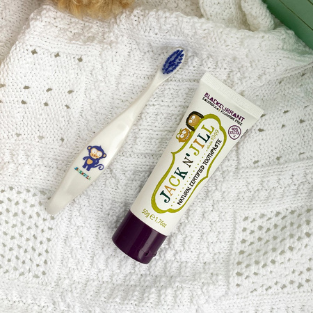 Jack N' Jill, Naturalna pasta do zębów dla dzieci o smaku czarnej porzeczki bez fluoru, 6m+, 50 g